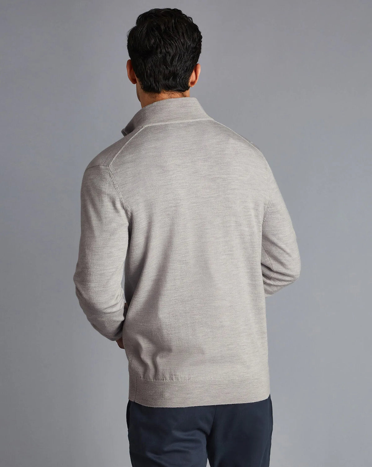 Men's grey knit sweater back view with quarter-zip
