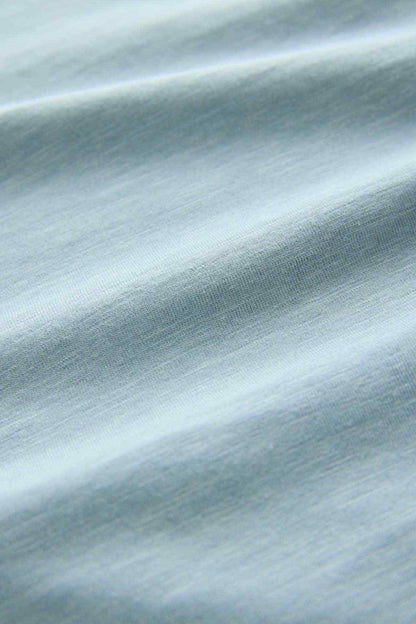 Light blue T-shirt jersey fabric close-up