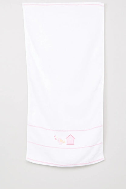 White baby blanket with pink edge trim and stitched house-and-bunny motif