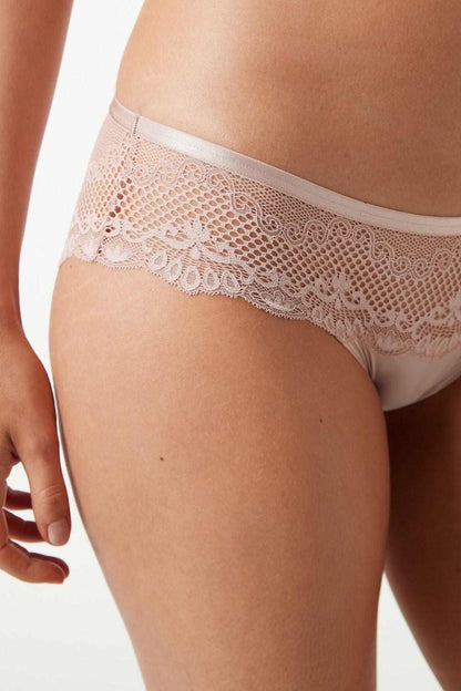 Light pink lace lingerie briefs with scalloped waistband and lace coverage