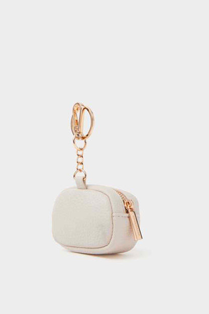 Cream zip pouch keychain with side zipper pull and metal chain ring