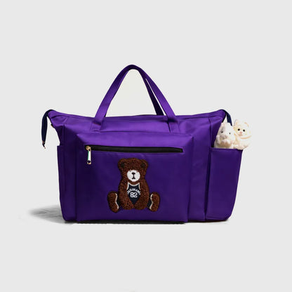 Purple large tote bag with teddy bear patch and front zip pocket