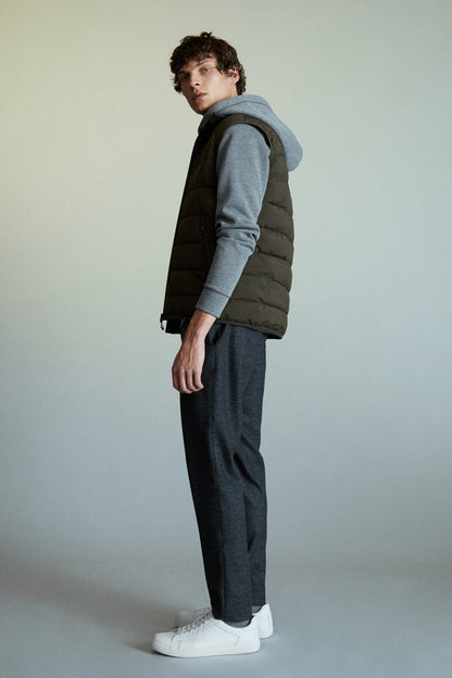 Dark gray tailored trousers in straight fit, side view with cuffed hem and belt loops.