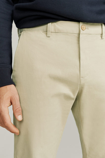 Beige chino trousers with front fly seam and belt loop
