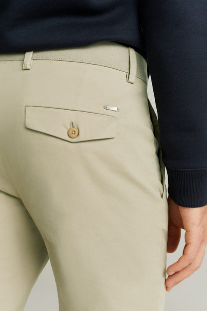 Beige chino trousers with side flap pocket, button detail