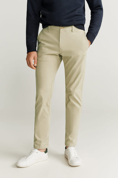 Beige chino-style trousers with belt loops, button-zip front, cuffed hem