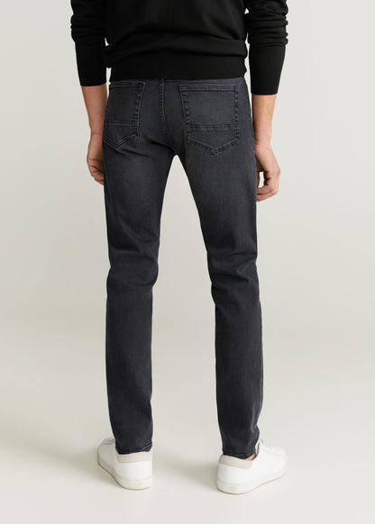Men's dark grey denim jeans, button-and-zip fly, five-pocket design