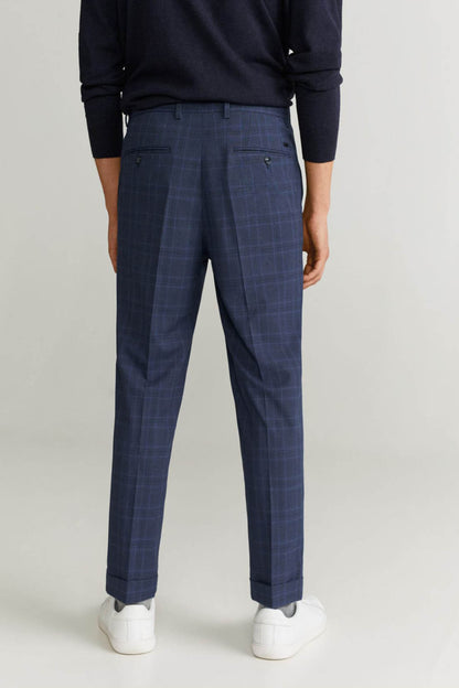 Men's dark navy plaid trousers with side seam pockets and straight legs