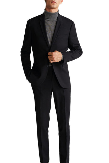 MANGO black blazer worn with matching black trousers