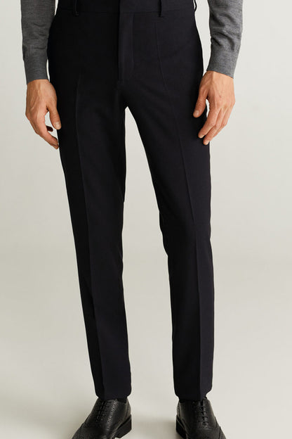 MANGO black trousers full length view with crease and tapered legs
