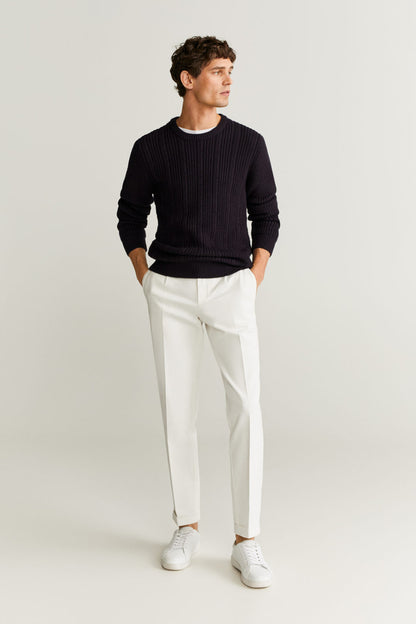 White slim-fit trousers with belt loops and zip fly