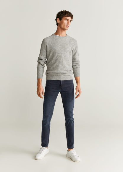 Dark blue slim-fit jeans, five-pocket styling