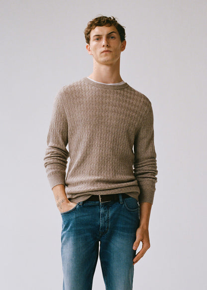 Beige textured knit crewneck sweater with ribbed cuffs and hem