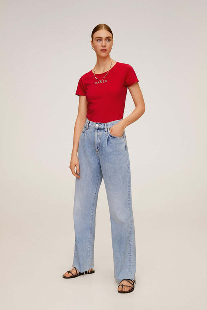 Red crewneck graphic T-shirt with MANGO logo, paired with light-wash wide-leg jeans