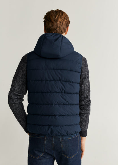 Back view of dark navy quilted hooded puffer vest with zip front
