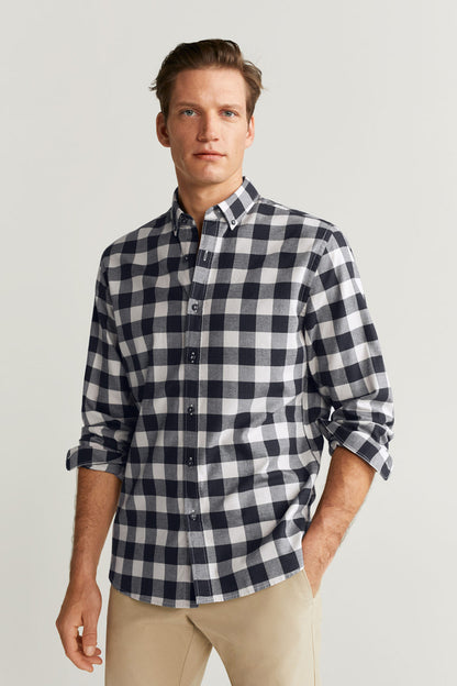 Dark blue and white checkered button-up shirt with long sleeves, front view