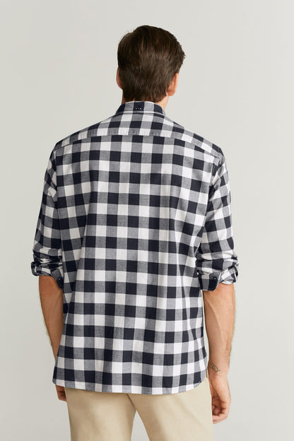Dark blue and white checkered button-up shirt, back view, long sleeves
