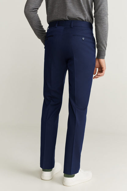 Men's dark blue dress trousers with side pockets and slim tapered fit