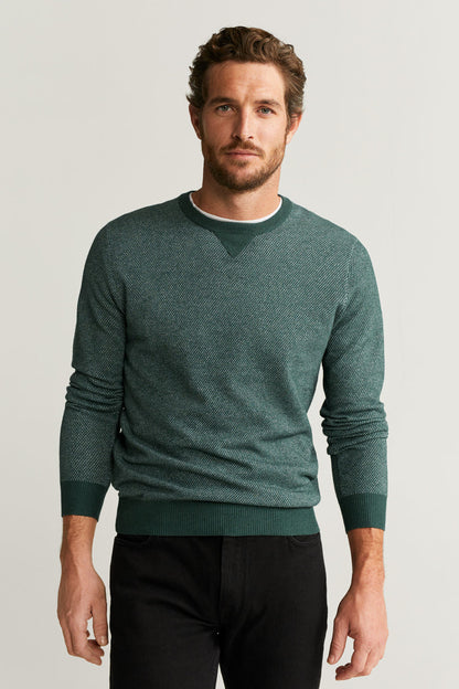 Green crewneck knit sweater with ribbed cuffs and hem, long sleeves