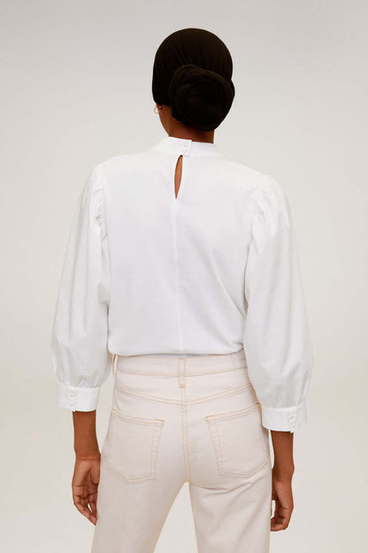 Off-white blouse with keyhole back neck and puffed long sleeves