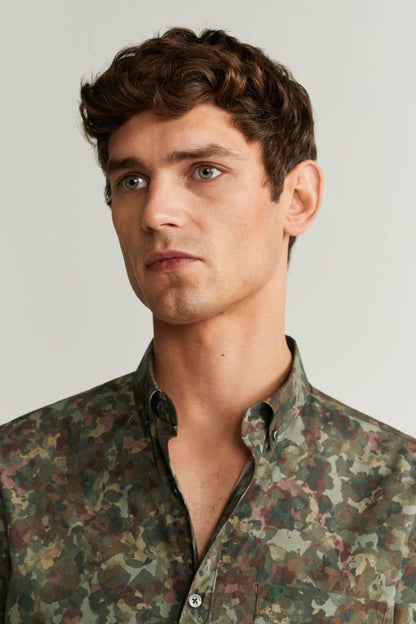 Men's khaki camo button-up shirt close-up of collar and front placket