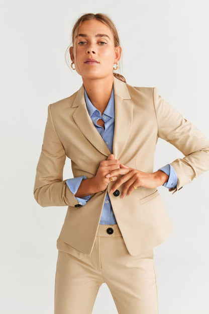 Beige slim suit trousers with button waist, belt loops and ankle hem
