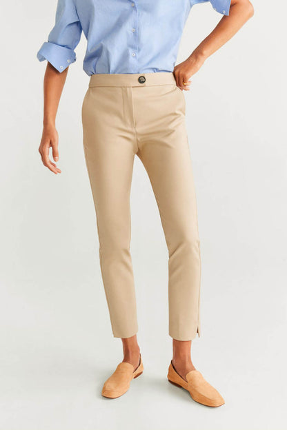 Beige tailored trousers with button closure, belt loops and ankle-length slim fit