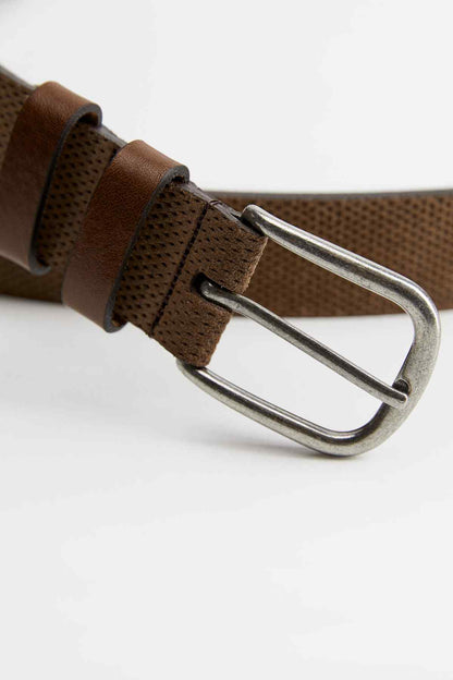 Mango beige-brown perforated leather belt, close-up of silver-tone buckle