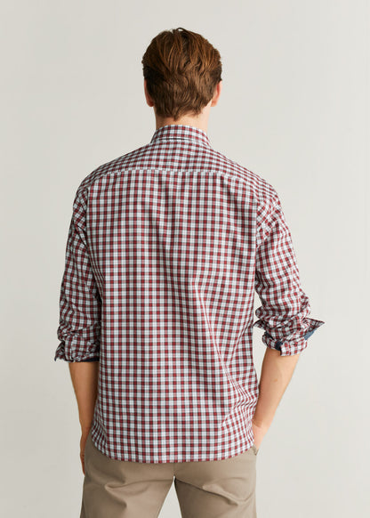 MANGO red/white/navy plaid button-up shirt, back view with roll-up sleeves