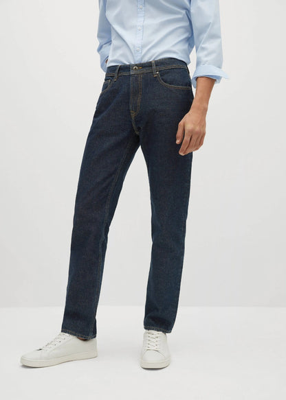 Dark blue denim jeans with belt loops, button fly, and straight leg
