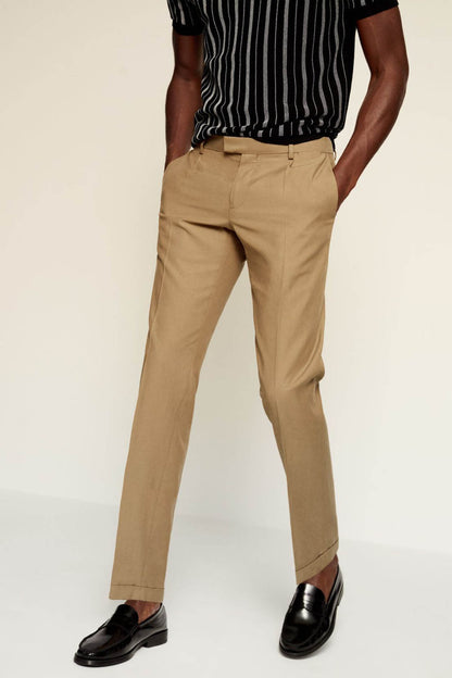 Men's tan chino trousers with belt loops, button closure, and straight legs
