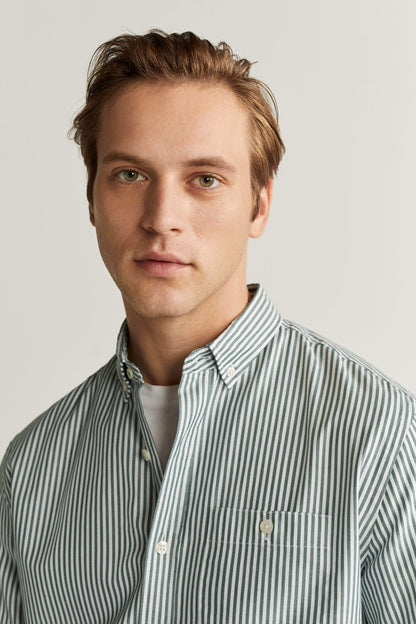 Striped button-up shirt front with pointed collar and chest pocket, light blue and white