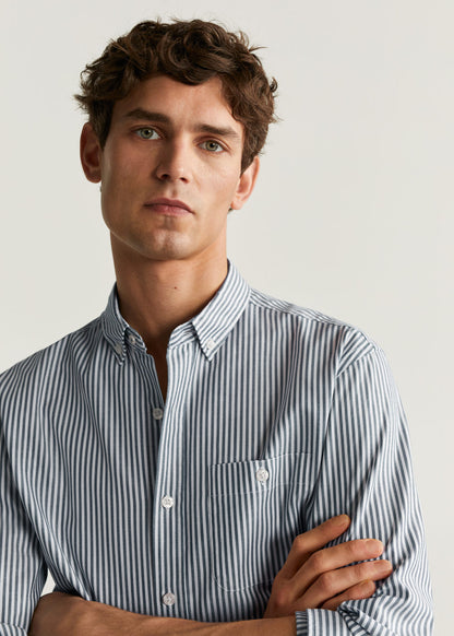 Front view of dark navy striped button-up shirt with chest pocket and buttoned placket