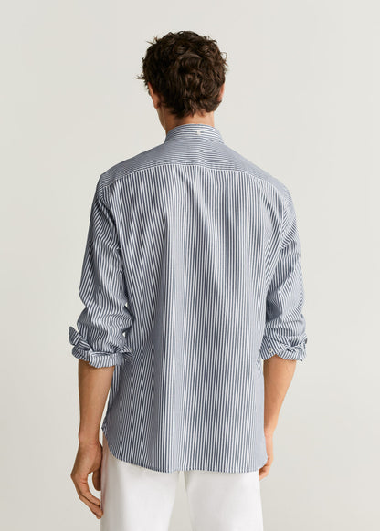 Back view of dark navy striped button-up shirt with long sleeves and button cuffs