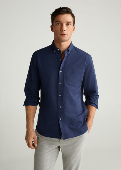 Men's dark navy button-up shirt with chest pocket and long sleeves