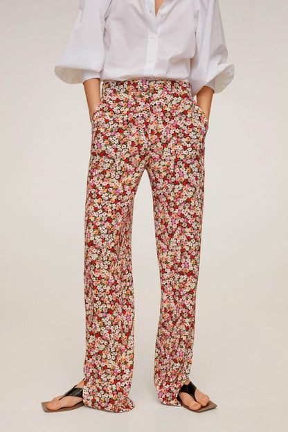 Floral print trousers with elastic waist and full-length wide leg opening