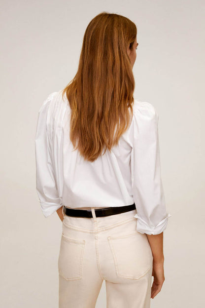 Off-white blouse back view with gathered shoulder detail and long puff sleeves