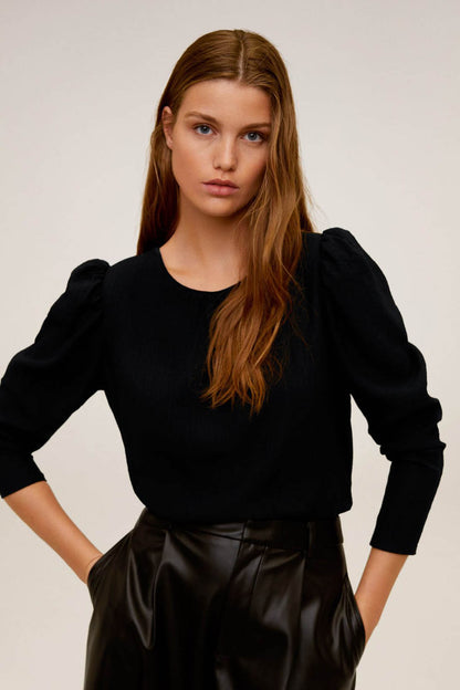 Black blouse with puff sleeves, fitted bodice, round neck