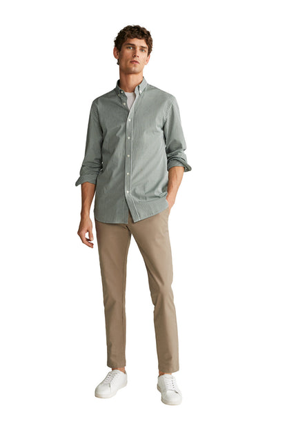 Men's check button-down shirt with long sleeves, front view, paired with khaki pants