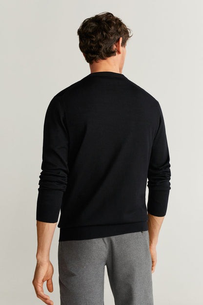 Back view of black V-neck button cardigan with long sleeves