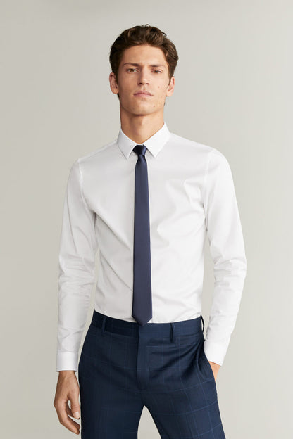 White dress shirt with button front, spread collar, long sleeves