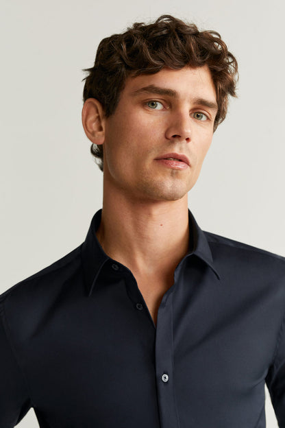 MANGO black button-up shirt close-up, collar and front buttons