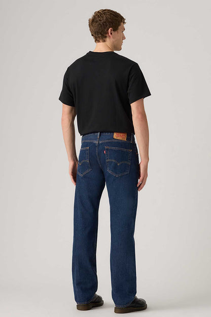 Dark indigo denim jeans, back view with yoke and five-pocket design