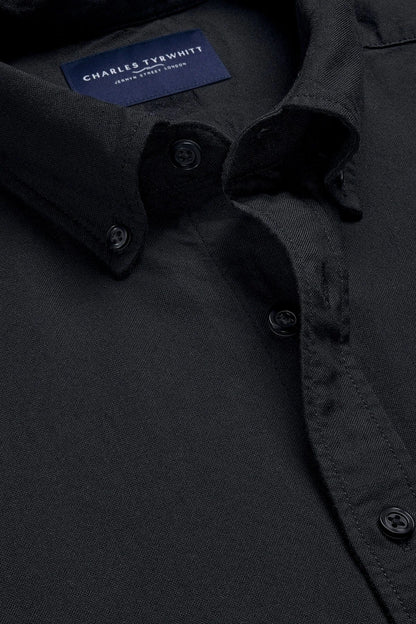 Charles Tyrwhitt black shirt with button placket and interior neck label
