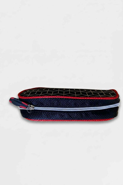 Kids' zip pencil case with navy body, black grid top, and red piping
