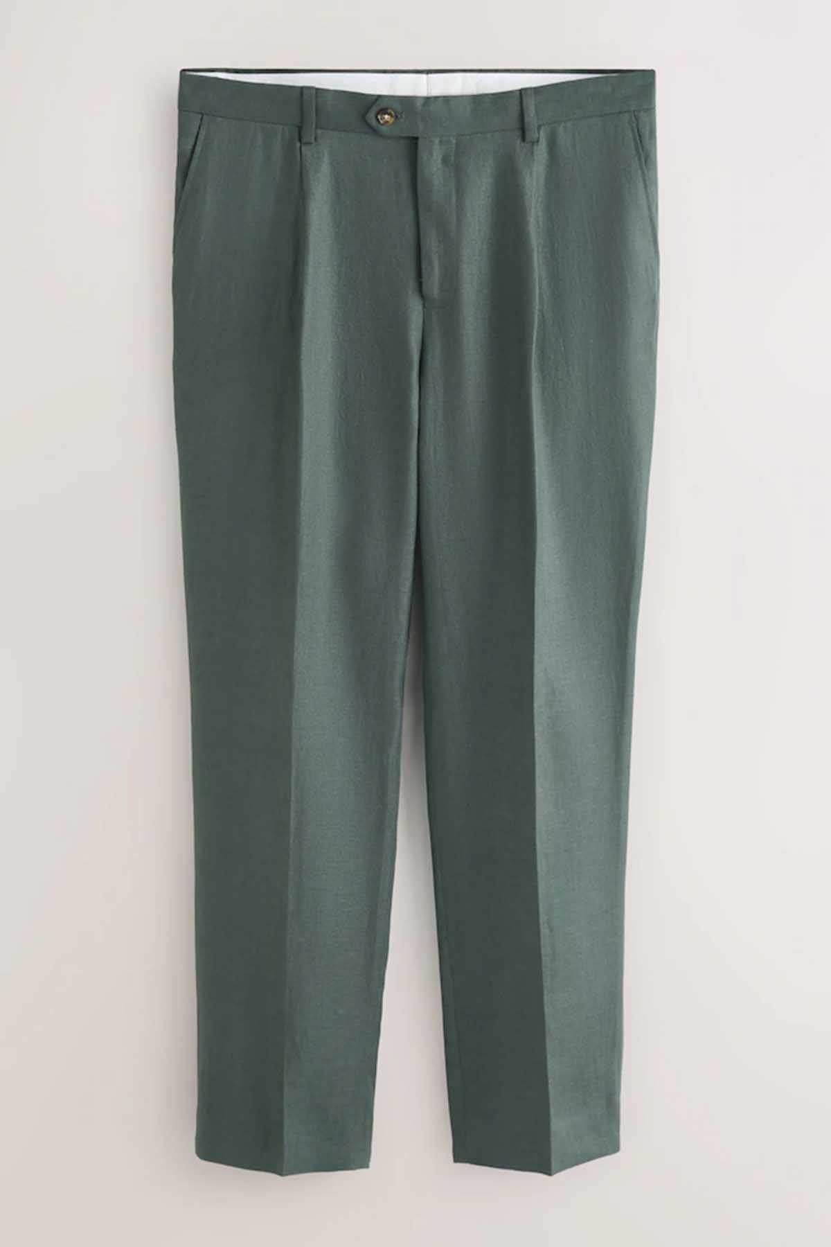 Men's green suit trousers with front pleats and button closure