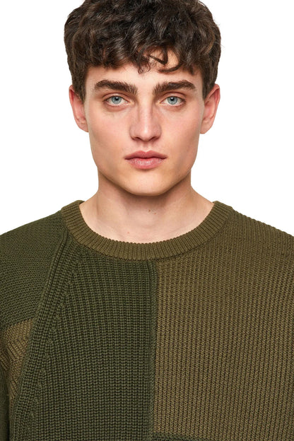 Diesel green patchwork knit sweater close-up of crewneck and textured panels