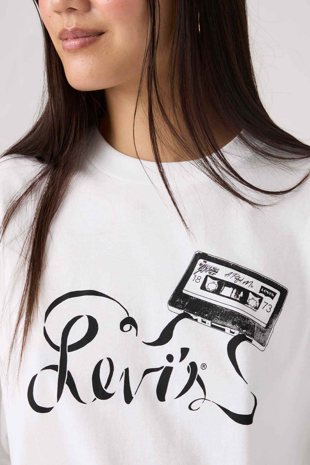 White crewneck T-shirt with black logo graphic and teapot-style illustration