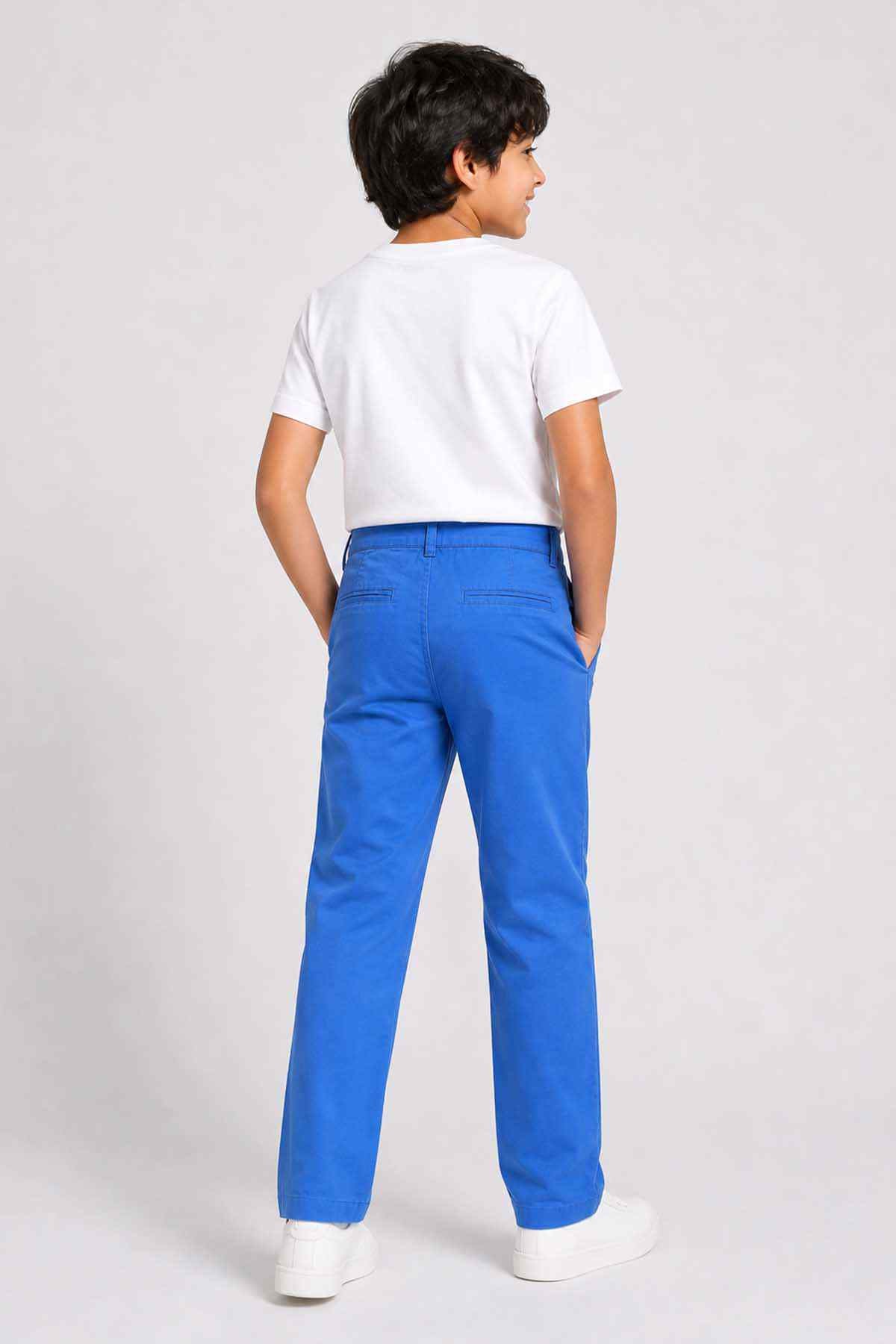 Blue denim pants for kids back view with button waist and straight legs.