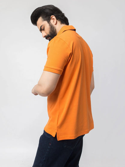 Brumano orange polo shirt back/side view, short sleeves and collar